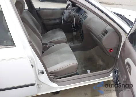 1997 Toyota Corolla Ce z USA, uszkodzony, nr VIN 1NXBA02E1VZ556957